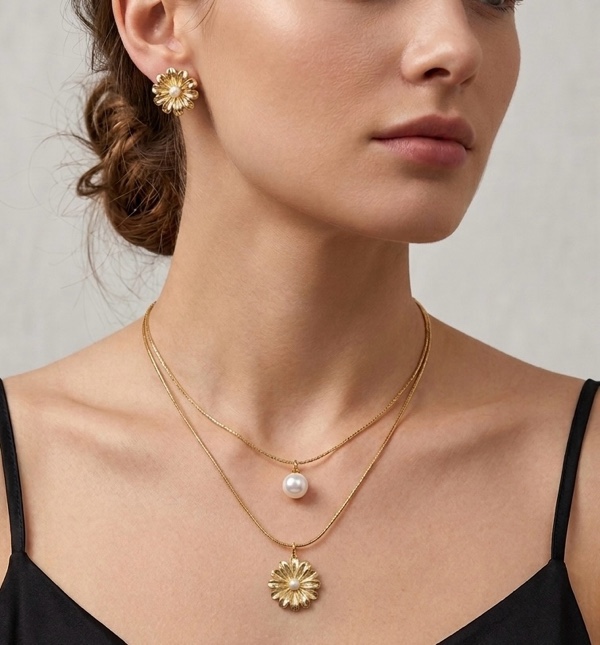 SET CADENAS Y TOPO DE FLOR DORADO