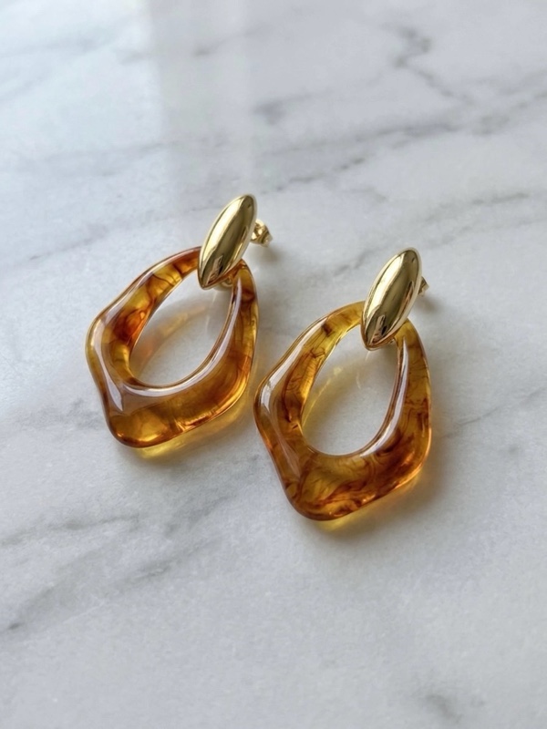 ARETES SEMI OVALADO CAFÉ DORADO