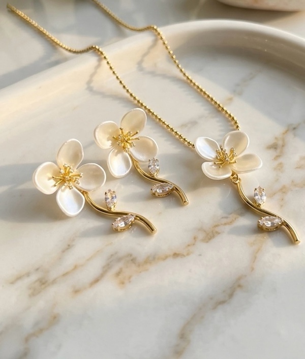 SET FLOR GRANDE BLANCA NACAR Y TOPOS DORADO