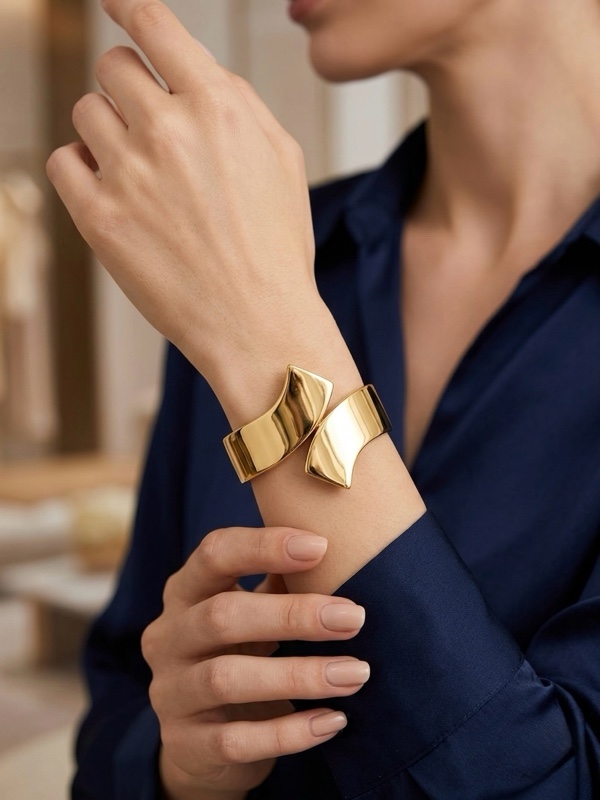 BRAZALETE RIGIDO RODIO DELGADO DORADO