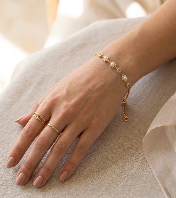 PULSERA EN RODIO FLORES PEQUEÑAS DORADO