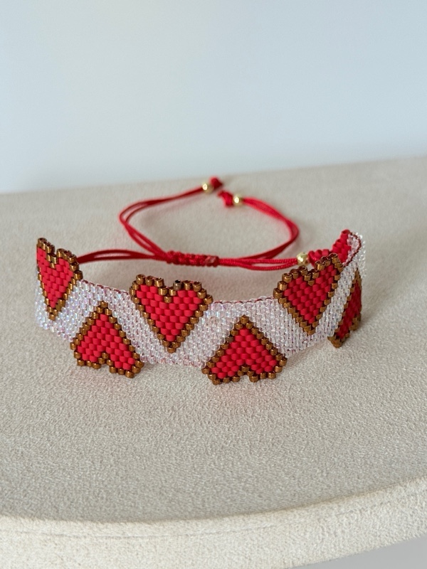 PULSERA TEJIDA EN MIYUKI CORAZONES INVERTIDOS DORADO